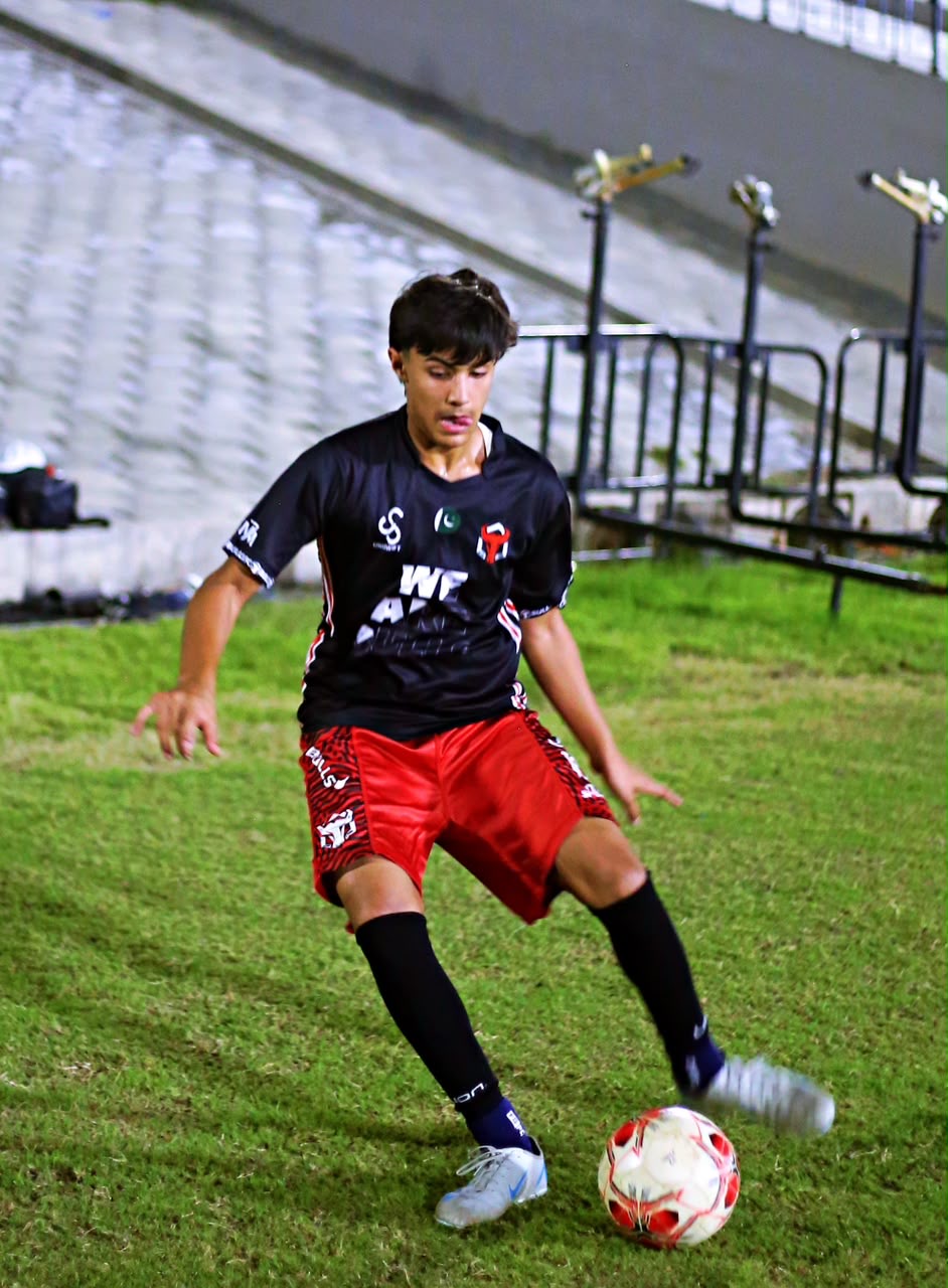 Zavyan Haider focused on the football during match play