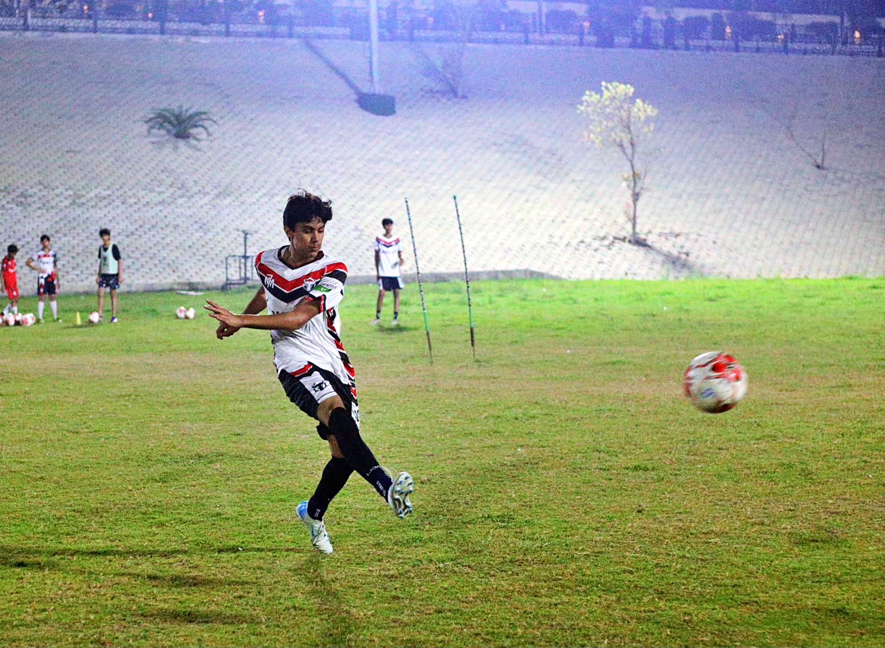 Zavyan Haider striking the football during training